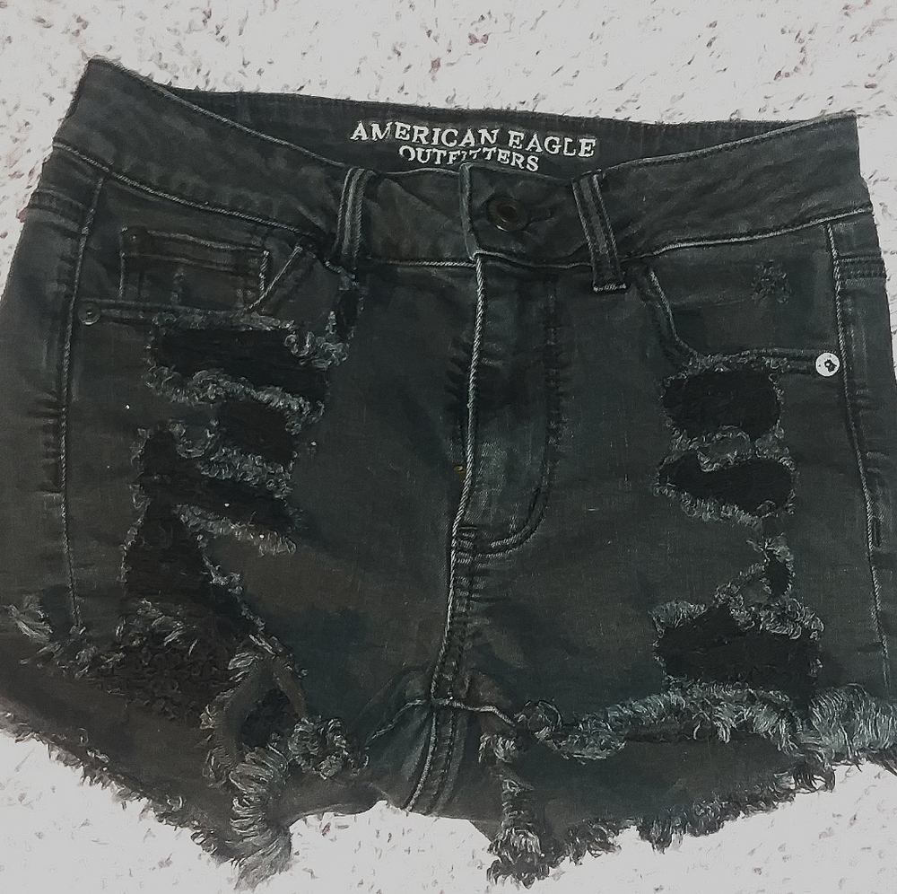 Distressed Black denim shorts